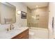 Stylish bathroom featuring modern fixtures, a sleek vanity, and a combined tub and shower at 2008 Ridgewood Rd, Chapel Hill, NC 27516