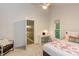 Bright bedroom with a desk area, neutral tones and natural light at 2008 Ridgewood Rd, Chapel Hill, NC 27516