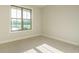 Bright bedroom with a large window offering a view of the outdoors at 205 Big Bradley Dr, Wendell, NC 27591