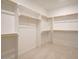 Spacious walk-in closet with built-in shelving and ample storage space at 205 Big Bradley Dr, Wendell, NC 27591