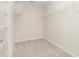 Walk-in closet with carpet and wire shelving at 211 Whitney Ln, Durham, NC 27713