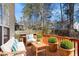 Relaxing outdoor deck area with comfortable seating and stylish decor at 211 Whitney Ln, Durham, NC 27713
