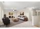 Cozy living room featuring comfortable seating, soft carpet, and neutral decor at 211 Whitney Ln, Durham, NC 27713