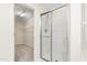 Bathroom features an enclosed shower with glass sliding door at 211 Whitney Ln, Durham, NC 27713