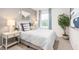Cozy bedroom with a large window, a comfortable bed, and stylish decor creates a relaxing retreat at 239 Perseus St, Angier, NC 27501