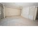 Spacious bedroom with carpet, ceiling fan, built-in storage and a large picture window at 30 Brookside Place, Durham, NC 27705