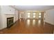 Spacious living room with fireplace and hardwood floors at 30 Brookside Place, Durham, NC 27705