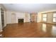 Spacious living room features hardwood floors, fireplace, built-in shelves and natural light at 30 Brookside Place, Durham, NC 27705