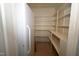 Pantry features ample shelving space to help keep your groceries and supplies well organized at 30 Brookside Place, Durham, NC 27705