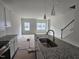 New kitchen featuring granite countertops, stainless steel appliances and an open layout at 332 Chesapeak Commons St # 141, Garner, NC 27529
