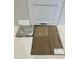 A collection of material samples including flooring, counter top, cabinet and backsplash at 332 Chesapeak Commons St # 141, Garner, NC 27529