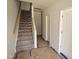 New home construction with an interior staircase featuring wood handrail and steps covered for protection at 332 Chesapeak Commons St # 141, Garner, NC 27529