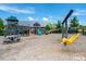 Community playground featuring a slide, swings, picnic table, and various climbing structures at 401 Shadow Falls Dr, Wendell, NC 27591