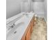 Functional bathroom with a dual sink vanity, a large mirror, and a tub/shower combination at 405 Ganyard Farm Way, Durham, NC 27703
