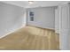 Bedroom with neutral carpet, window, and a closet at 405 Ganyard Farm Way, Durham, NC 27703