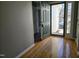 Inviting foyer with hardwood floors, a storm door, and views into other rooms of the home at 4300 Mantua Way, Raleigh, NC 27604