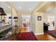 Spacious foyer with hardwood floors, a decorative table, and views into the living spaces at 4409 Driftwood Dr, Raleigh, NC 27606