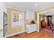 Kitchen area featuring granite countertops, white cabinets, and stainless appliances at 4409 Driftwood Dr, Raleigh, NC 27606