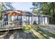 Exterior of the house with a patio table on the deck at 5108 Walton Hill Rd, Knightdale, NC 27545