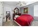 Bedroom featuring a comfortable bed, dresser, and stylish decor at 5108 Walton Hill Rd, Knightdale, NC 27545