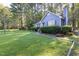 Inviting home with a lush green lawn and well-maintained landscaping at 5108 Walton Hill Rd, Knightdale, NC 27545
