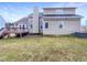 The backyard features a deck and plenty of green space at 5317 Tifton Dr, Raleigh, NC 27610