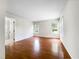 Bright bedroom with hardwood floors, natural light, and an ensuite bathroom for added convenience at 5317 Tifton Dr, Raleigh, NC 27610