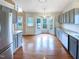 This kitchen features gray cabinets, stainless steel appliances, and an eat-in area at 5317 Tifton Dr, Raleigh, NC 27610