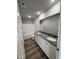 Bathroom featuring double sinks, granite countertops, and a tub/shower combination, designed for relaxation and convenience at 57 Faucette Dr, Selma, NC 27576