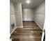Large walk-in closet with ample storage and shelving, offering an organized space for your wardrobe needs at 57 Faucette Dr, Selma, NC 27576