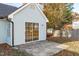 Backyard view of a patio with sliding glass doors at 605 Stratton Way, Durham, NC 27704