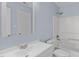 Bright bathroom featuring a shower and tub combination with modern fixtures and a vanity at 605 Stratton Way, Durham, NC 27704