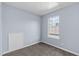 Bedroom featuring carpet flooring and natural light from the window at 605 Stratton Way, Durham, NC 27704