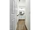 Bathroom featuring a modern vanity with contrasting hardware and laminate flooring at 606 E Pearsall St, Dunn, NC 28334