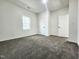 Comfortable bedroom with carpeting, a window and a closet at 606 E Pearsall St, Dunn, NC 28334