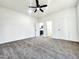Bedroom featuring a ceiling fan and views of the kitchen at 606 E Pearsall St, Dunn, NC 28334