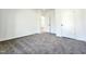 Neutral bedroom featuring plush carpet, ample closet space, and a bright, airy feel at 606 E Pearsall St, Dunn, NC 28334