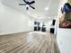 Spacious living room featuring modern open floor plan and vinyl flooring at 606 E Pearsall St, Dunn, NC 28334