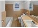 Bathroom featuring a large vanity and a shower/tub combo at 623 Sybil Dr, Durham, NC 27703