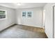 Bright bedroom with neutral carpet and large window offering an abundance of natural light at 623 Sybil Dr, Durham, NC 27703