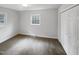 Bright bedroom featuring fresh paint and a large closet at 623 Sybil Dr, Durham, NC 27703