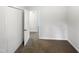 Bedroom featuring neutral carpet, bright window, and walk-in closet at 623 Sybil Dr, Durham, NC 27703