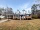 Charming brick home with a covered carport and well-maintained landscaping at 623 Sybil Dr, Durham, NC 27703