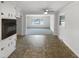 Bright kitchen leads into a living space with a ceiling fan at 623 Sybil Dr, Durham, NC 27703