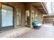 Cozy front porch area with a wooden deck and a bay window showcasing the home's natural light at 748 Shady Lawn Rd, Chapel Hill, NC 27514