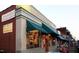 Exterior of Regulator Bookshop with green awning and books displayed at 816 Carolina Ave, Durham, NC 27705