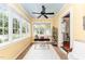 Bright office space featuring multiple windows, neutral colors, and a modern desk at 816 Carolina Ave, Durham, NC 27705