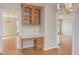 Kitchen desk area with wood cabinets and a view into other rooms at 816 Churchill Dr, Chapel Hill, NC 27517