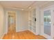 Spacious living room boasts hardwood floors, built-in shelves, and easy access to other rooms at 816 Churchill Dr, Chapel Hill, NC 27517