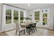 Dining area filled with natural light and a view of the yard at 206 Faith Ave, Sanford, NC 27330